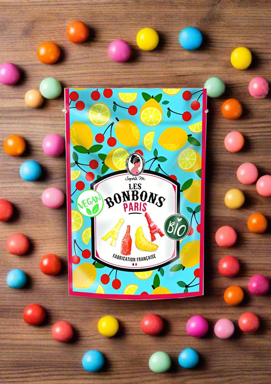 Bag of vegan sweets surrounded by bonbons