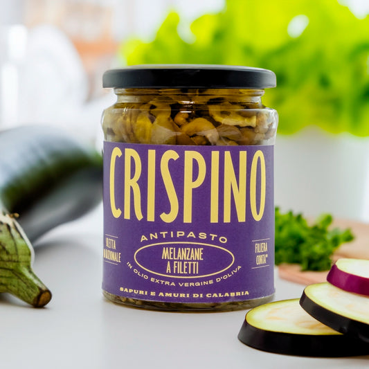 Crispino sliced aubergine in olive oil jar on table