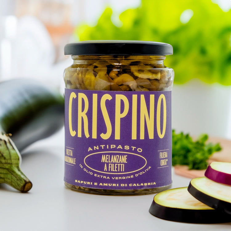 Crispino sliced aubergine in olive oil jar on table