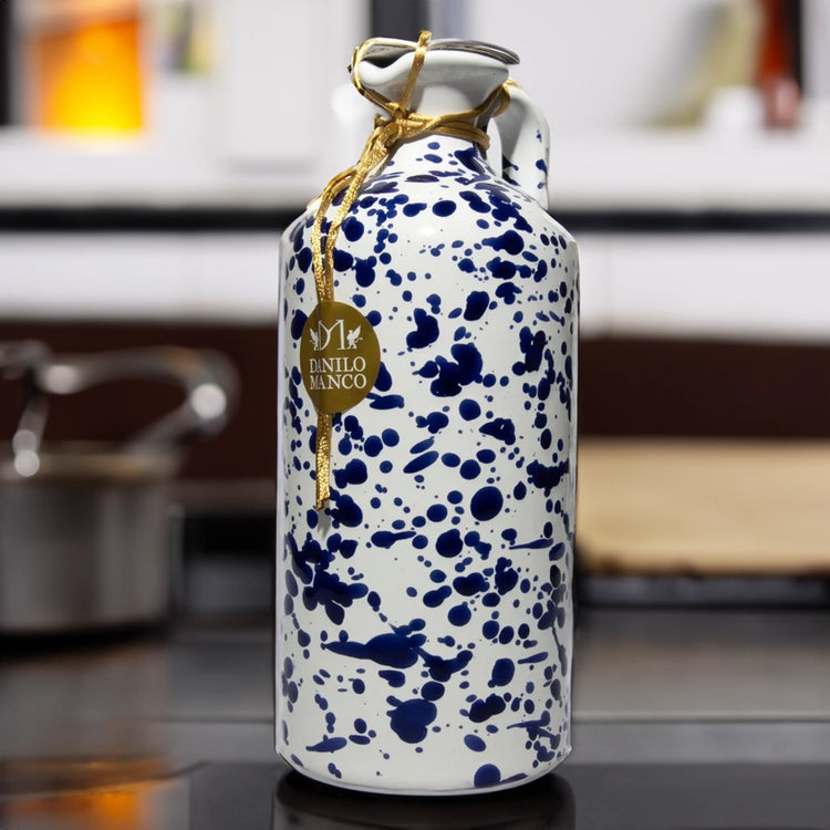 Danilo Manco Puglian Extra Virgin Olive Oil in glazed Terracotta Blue Bottle in kitchen