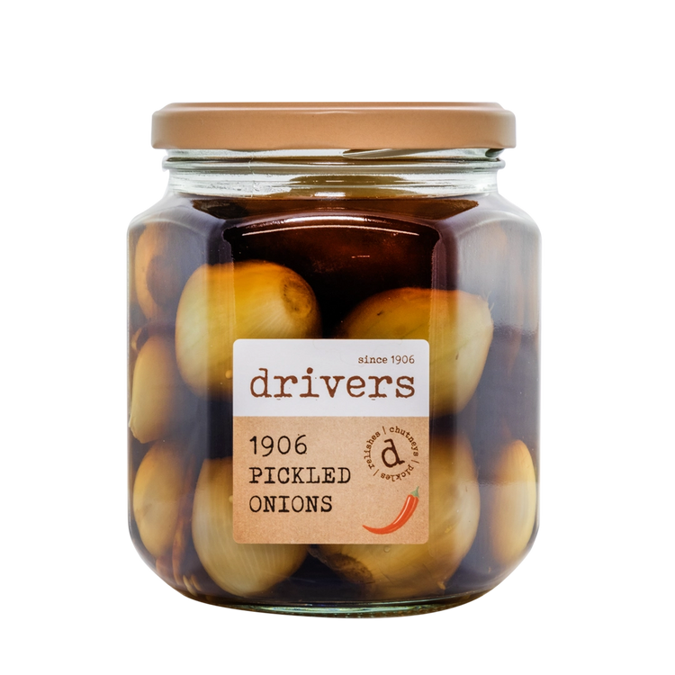 A hexagon glass jar with a label with the drivers logo with 1906 pickled onion written on the label.