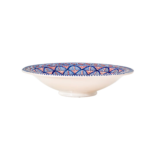 Side angle of an extra large decorative bowl with a vibrant, Moroccan-style, sunburst design