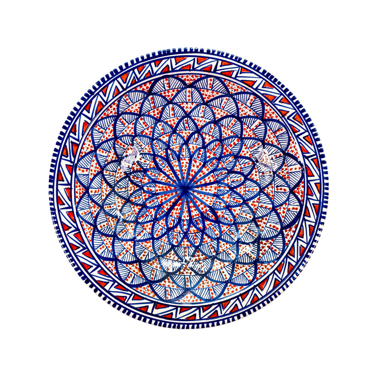 Moroccan-style extra large decorative bowl with a vibrant red and blue sunburst design