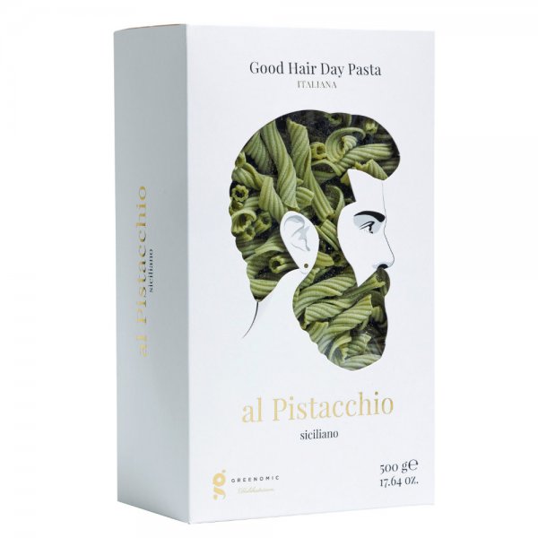 Good Hair Day Pasta logo on a white box with a mans hair cut out where you can see the Pistacchio pasta through the cut out