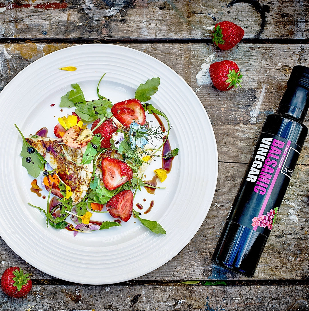 Jorge artisan balsamic vinegar drizzled over strawberries