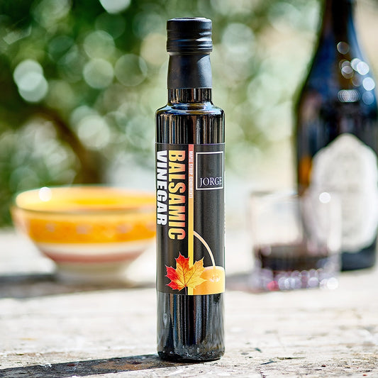 Jorge maple syrup infused balsamic vinegar on outdoor dining table