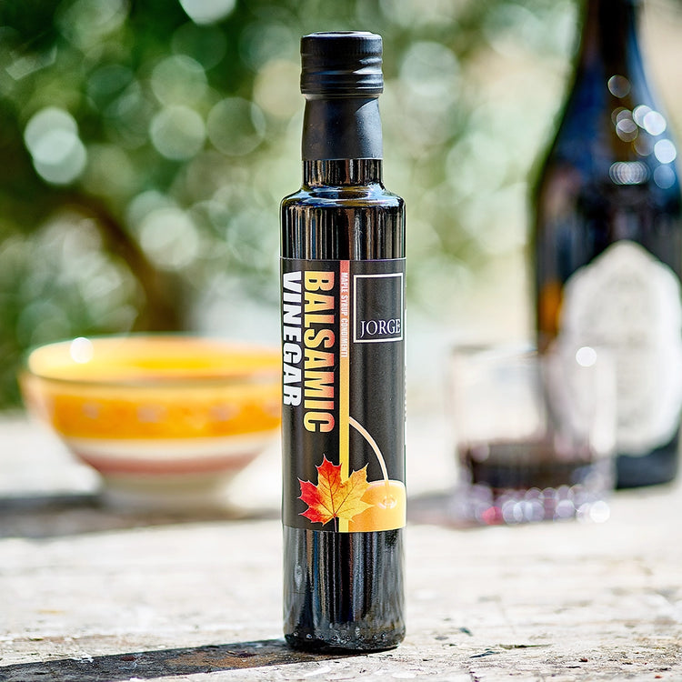 Jorge maple syrup infused balsamic vinegar on outdoor dining table