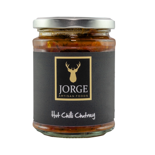 A jar of Jorge Artisan Foods Hot Chilli Chutney with a black label.