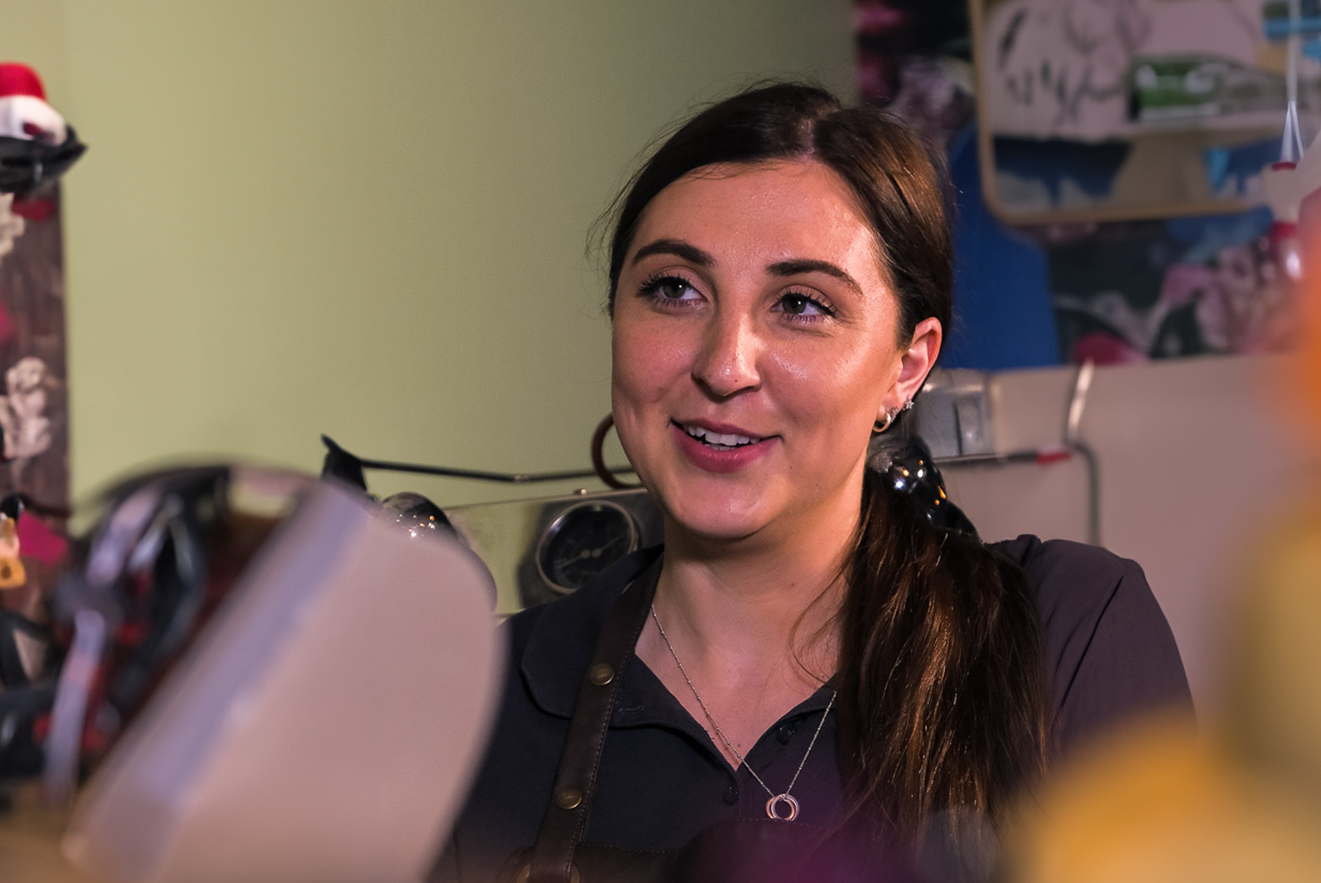 Jorge staff member jade working in the cafe