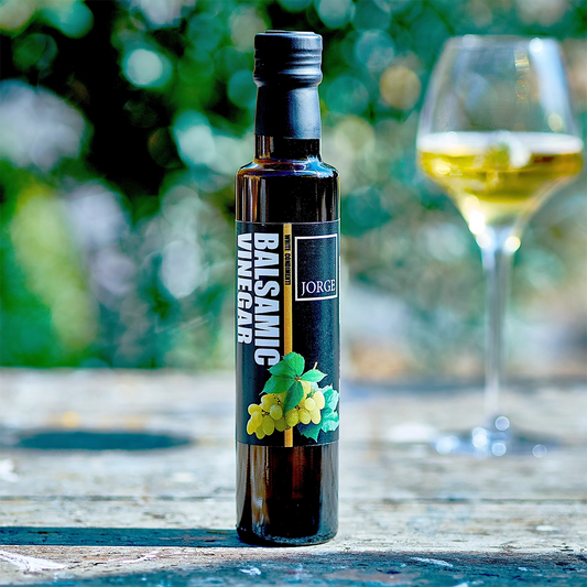 Jorge White Balsamic Vinegar bottle for alfresco dining with white wine glass