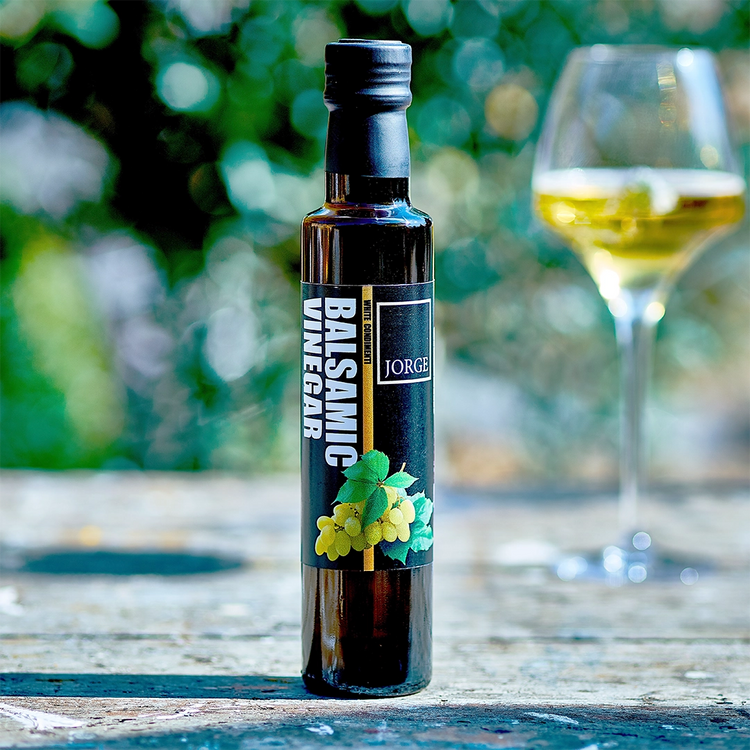 Jorge White Balsamic Vinegar bottle for alfresco dining with white wine glass