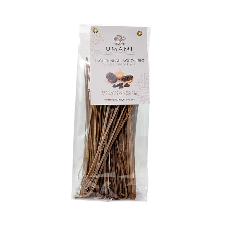 See through packet of black garlic tagliolini pasta