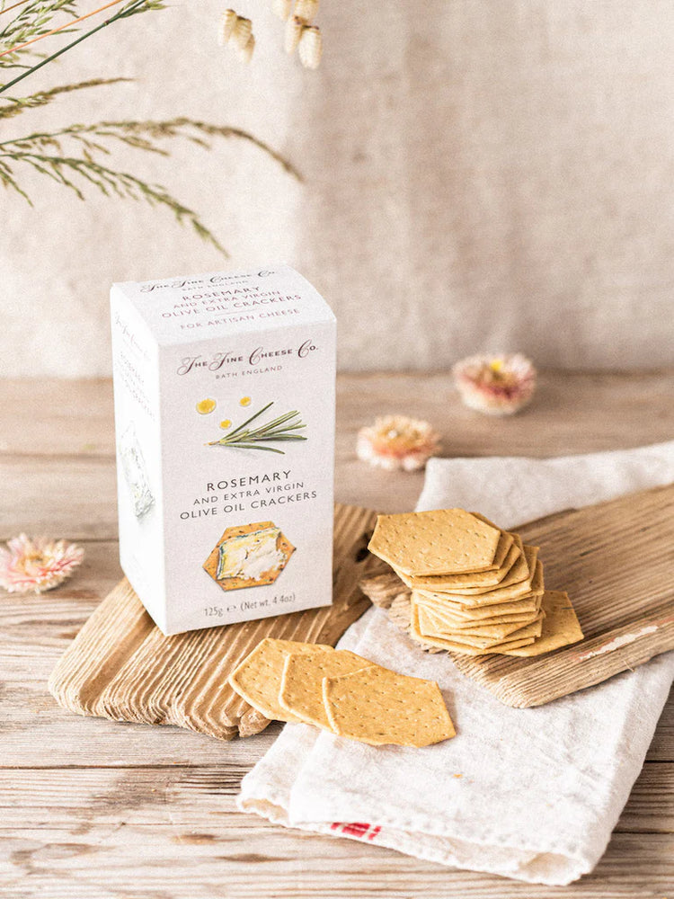 The Fine Cheese Co. Rosemary and Olive Oil Crackers on wooden table