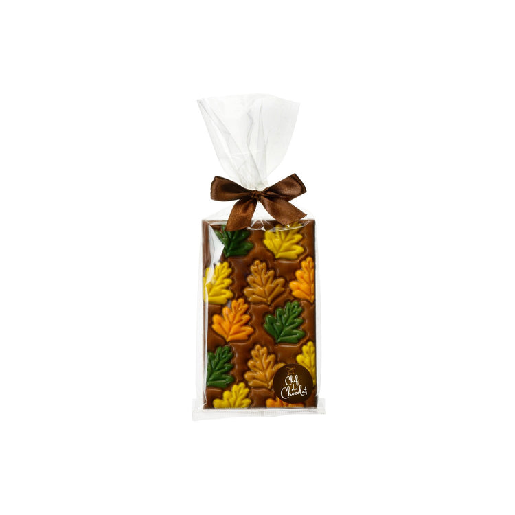 Decorated milk choc bar with leaves design in clear bag 150g