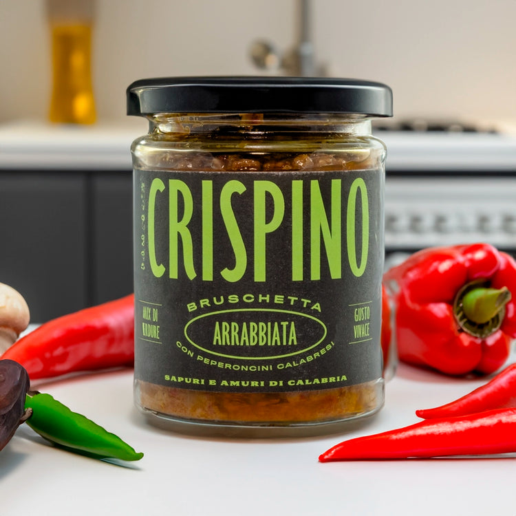 Crispino Bruschetta Arrabbiata topping on tables with fresh chillies