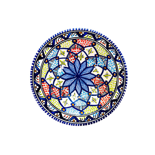 Intricate Moroccan style serving dish in red, blue, green pattern