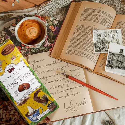 Lady Joseph artisan Chocolate filled biscuits with coffee cup and books